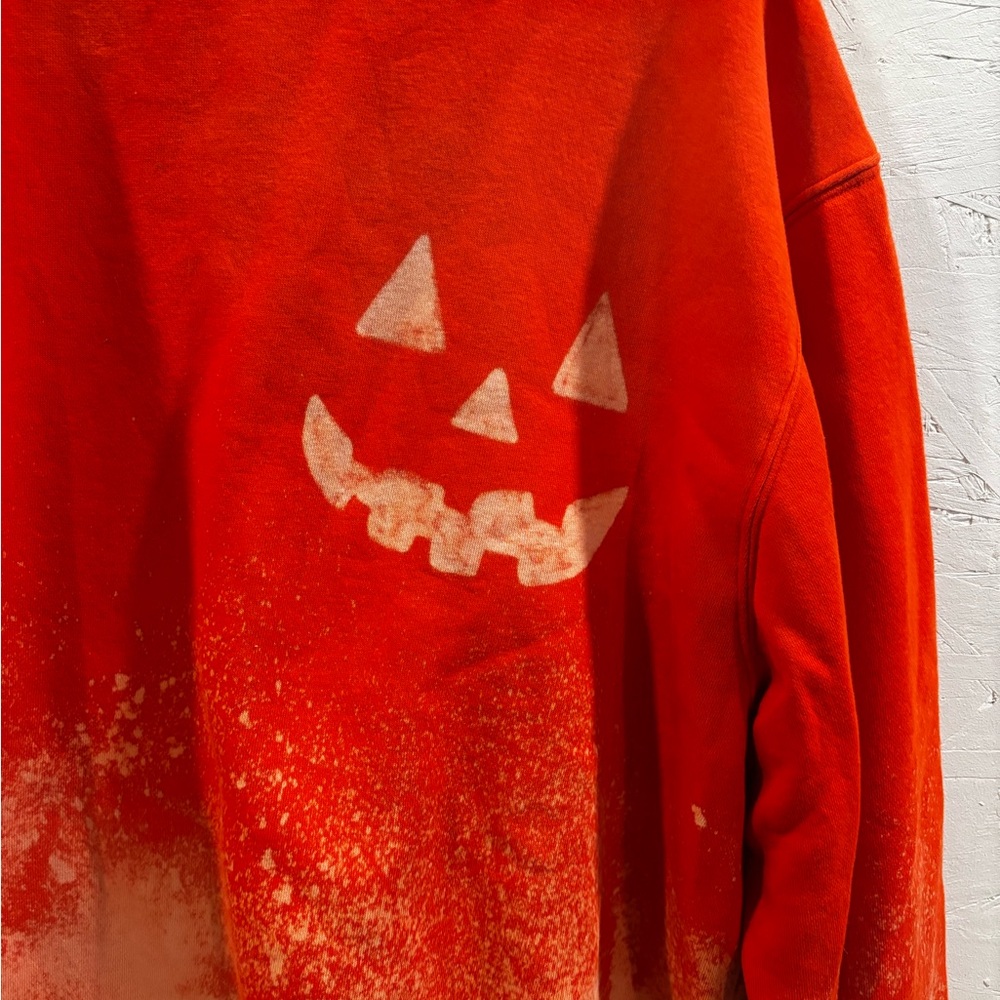 Orange Halloween Jack-O-lantern sweatshirt hand bleached design.